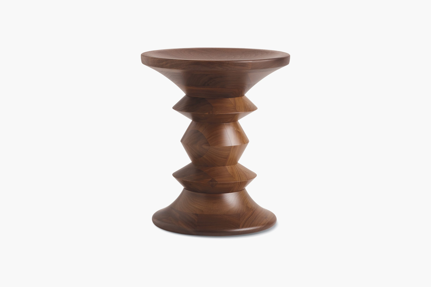the eames walnut stool, available in 3 different shapes (shown in shape c), is 10