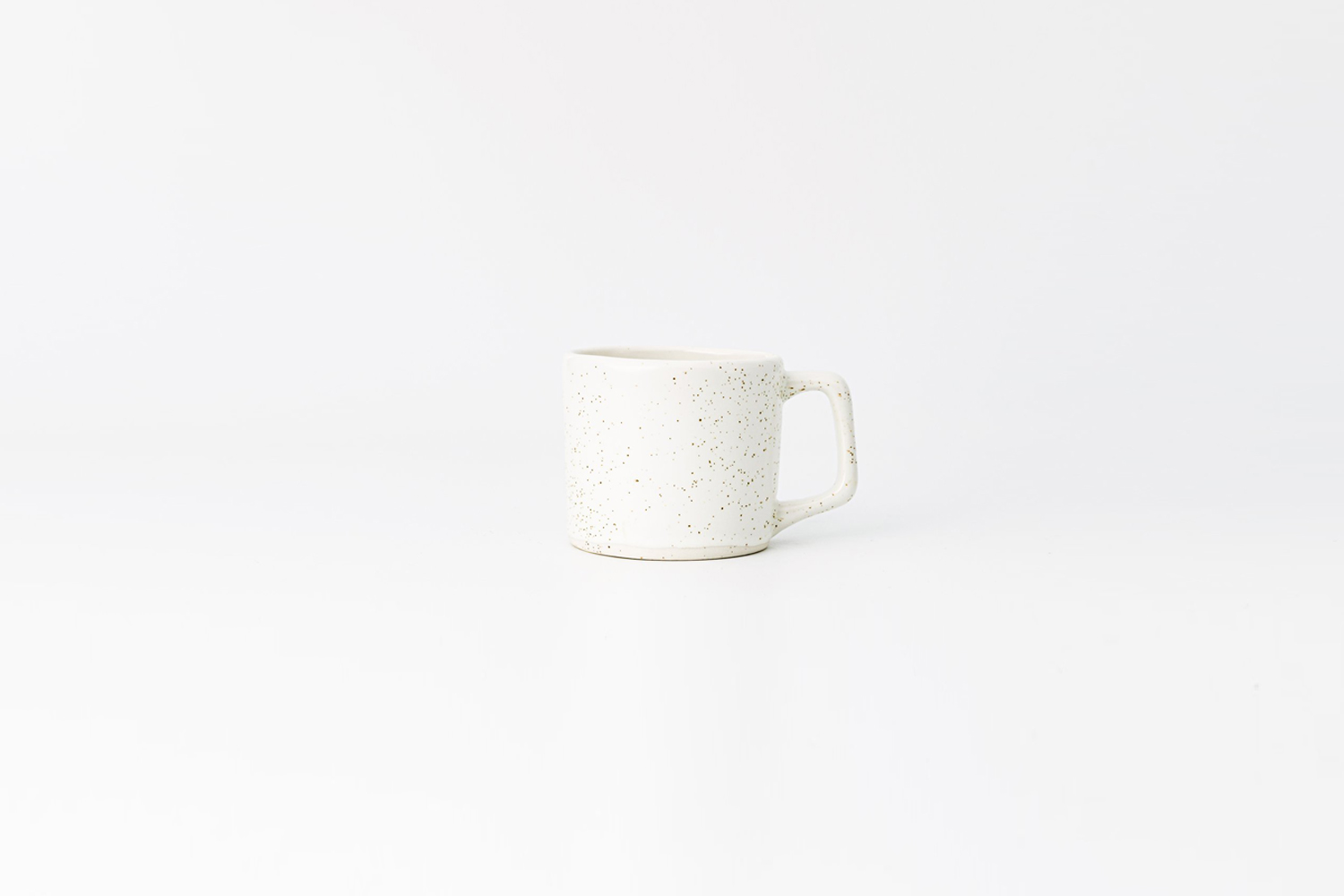 the haand 8 ounce short mug in birch (white with black spots) is \$3\1 at haand. 12