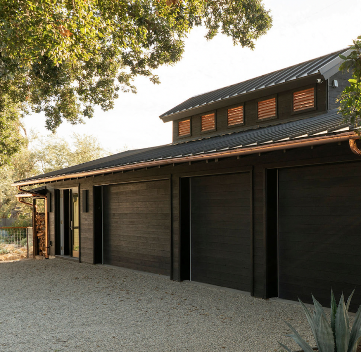 henderson clad the exterior in shou sugi ban from delta millworks and added a s 14