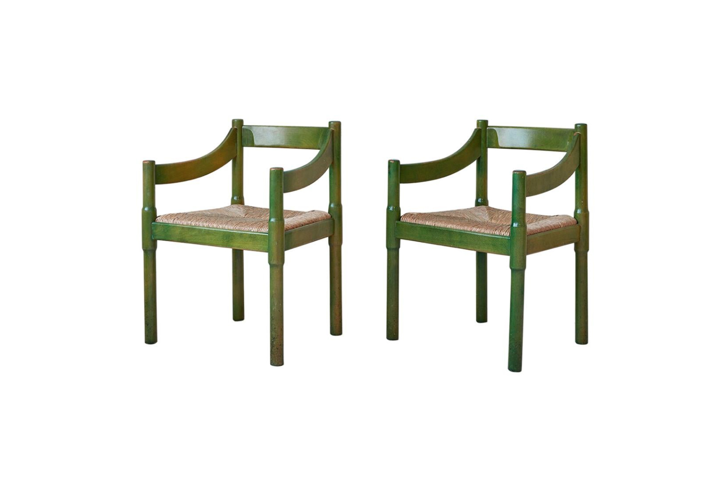 the chairs are vintage vico magistretti painted green wood carimate armchairs. 14
