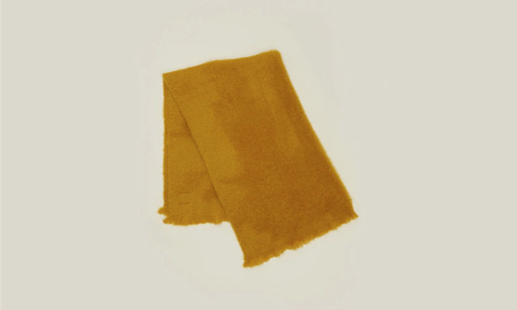 the solid mohair throw in mustard is \$\275 from hawkins new york. 19