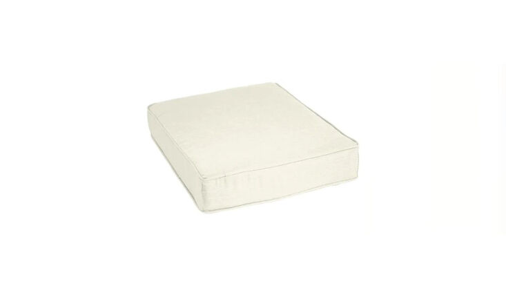 the indoor/outdoor sunbrella ottoman cushion in canvas natural is \$\1\26 from 21